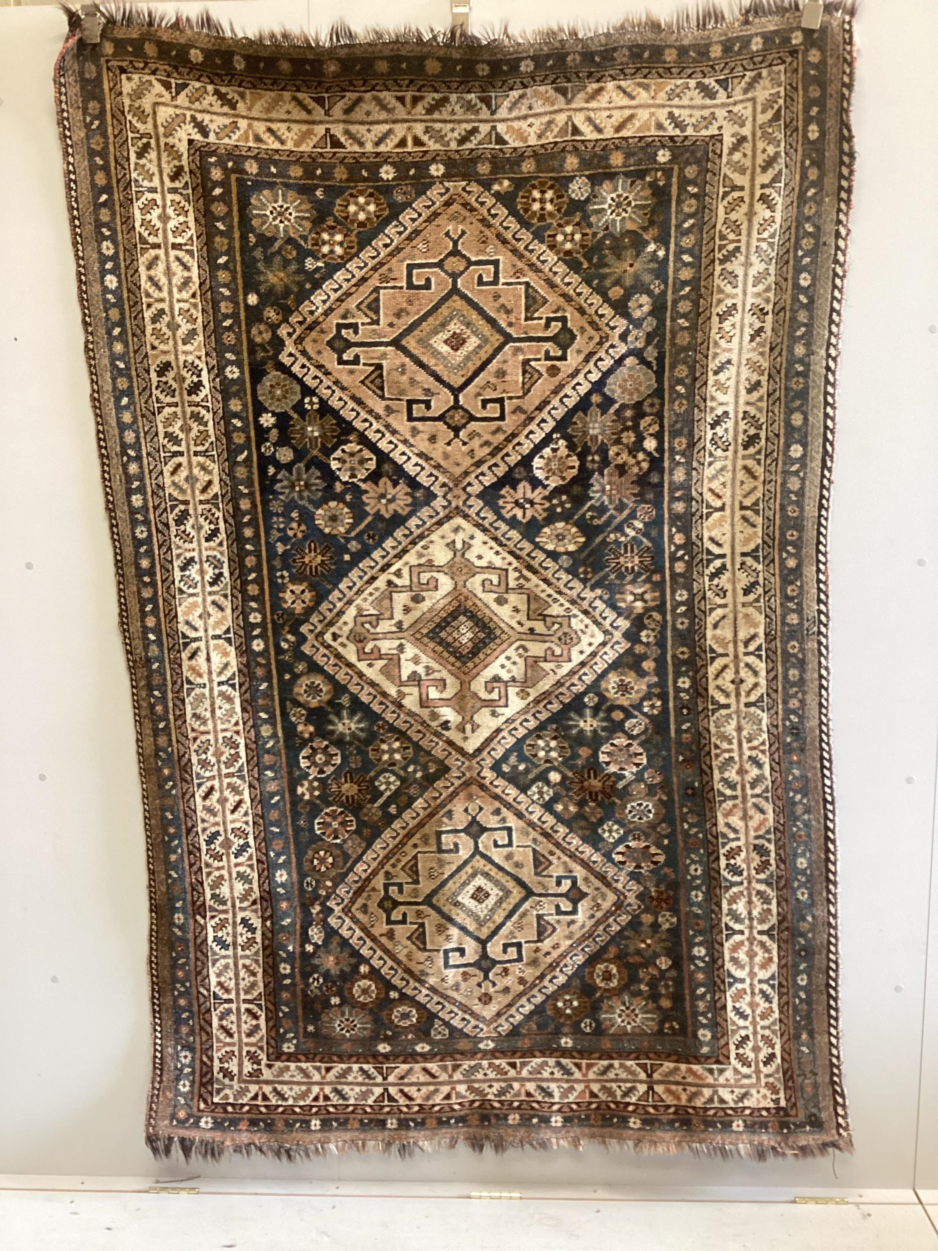 A Caucasian Kazak blue ground rug, 220 x 143cm. Condition - fair